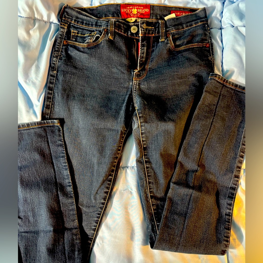 Lucky Brand “Sophia Skinny” size 4/27 long. Dark wash. Excellent condition.